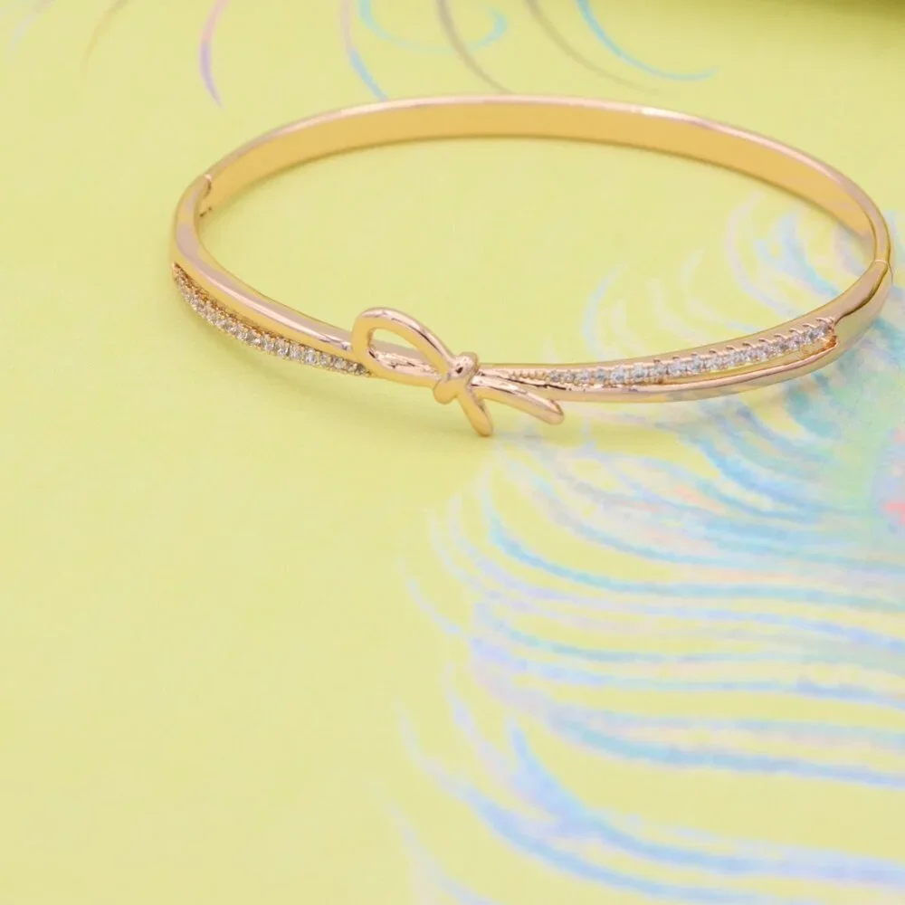 Rose Gold Bow Knot Bangle with Sparkling CZ Accents, XPBL0427